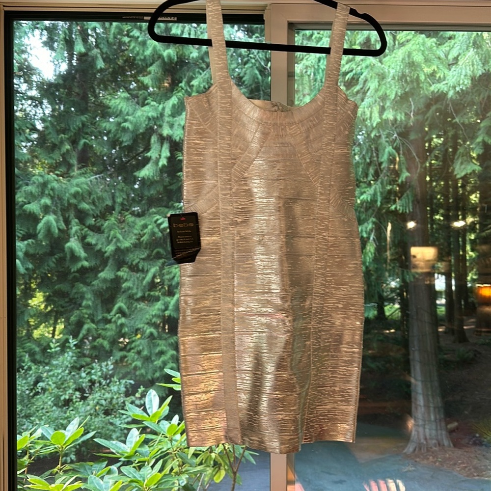 Bebe silver bodycon bandage dress